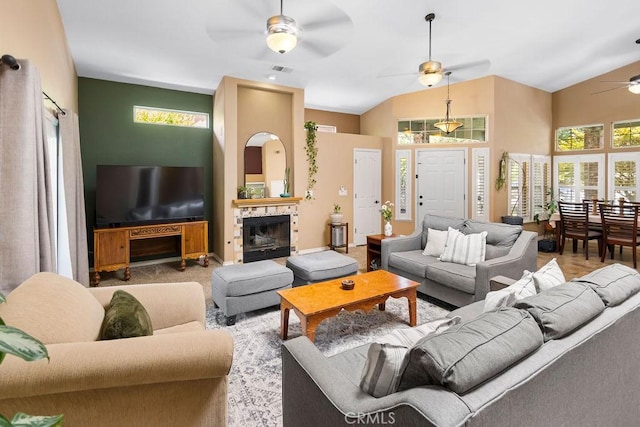 3475 Paseo Verde Ave, Merced, CA 95348 - living area with ceiling fan, healthy amount of natural light, high vaulted ceiling, and a stone fireplace