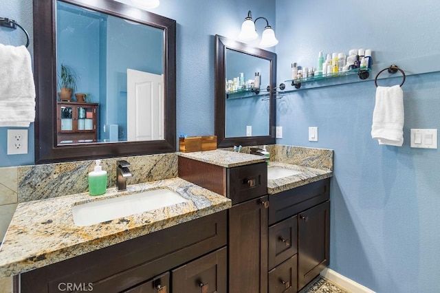 3475 Paseo Verde Ave, Merced, CA 95348 - full bathroom with two vanities and a textured wall