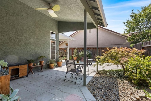 3475 Paseo Verde Ave, Merced, CA 95348 - fenced backyard featuring a patio and a ceiling fan
