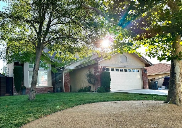 37398 Harrow Ct, Palmdale, CA 93550 - view of front facade with a garage, concrete driveway, a front yard, brick siding, and stucco siding