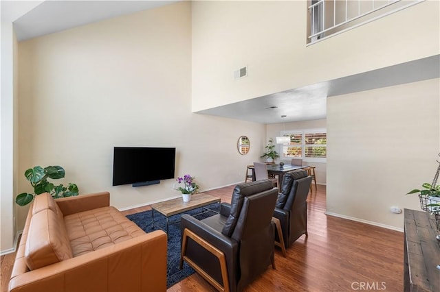 37398 Harrow Ct, Palmdale, CA 93550 - living area with a towering ceiling and wood finished floors