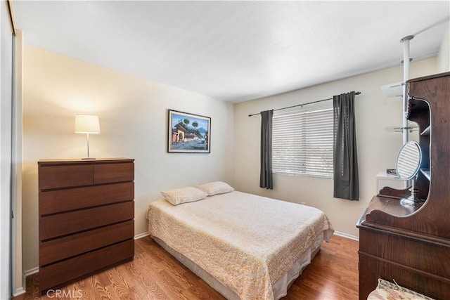 37398 Harrow Ct, Palmdale, CA 93550 - bedroom featuring wood finished floors and an AC wall unit
