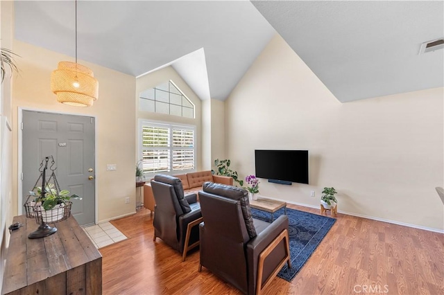37398 Harrow Ct, Palmdale, CA 93550 - living area with wood finished floors and vaulted ceiling