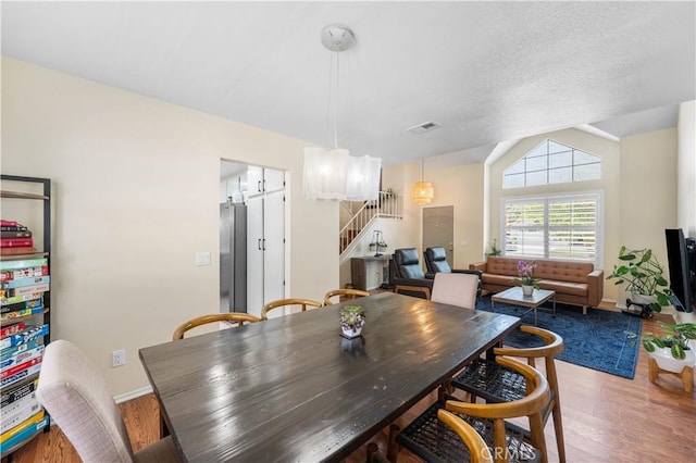 37398 Harrow Ct, Palmdale, CA 93550 - dining space with wood finished floors and stairway