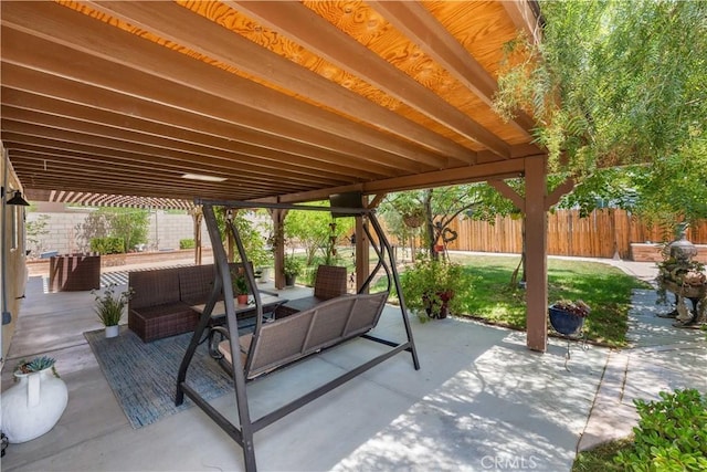 37398 Harrow Ct, Palmdale, CA 93550 - fenced backyard featuring an outdoor hangout area and a patio