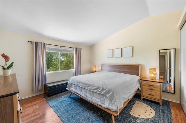 37398 Harrow Ct, Palmdale, CA 93550 - bedroom with vaulted ceiling and wood finished floors