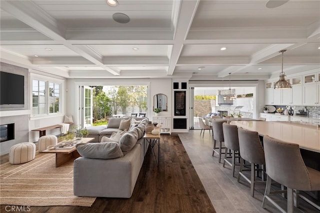 2711 Elm Ave, Manhattan Beach, CA 90266 - living area featuring coffered ceiling, dark wood-type flooring, beamed ceiling, recessed lighting, and ornamental molding