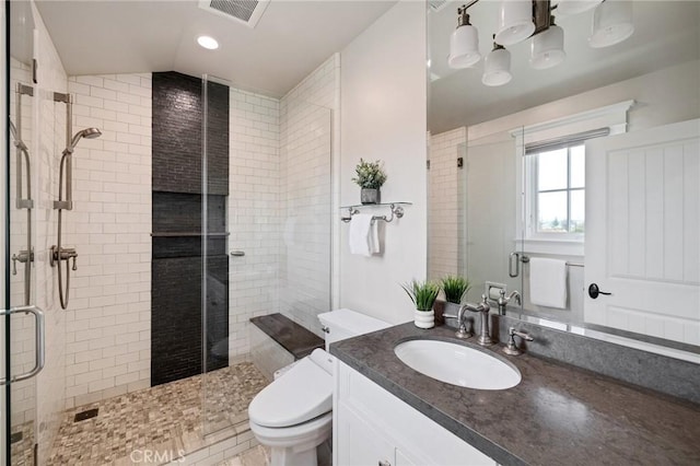 2711 Elm Ave, Manhattan Beach, CA 90266 - full bathroom with a fireplace, vanity, a shower stall, toilet, and lofted ceiling