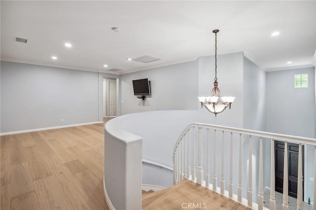 24274 Reyes Adobe Way, Valencia, CA 91354 - corridor featuring a chandelier, recessed lighting, light wood-style floors, an upstairs landing, and baseboards