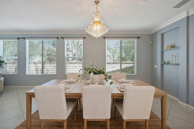 24274 Reyes Adobe Way, Valencia, CA 91354 - dining space featuring light tile patterned flooring, a chandelier, ornamental molding, and baseboards