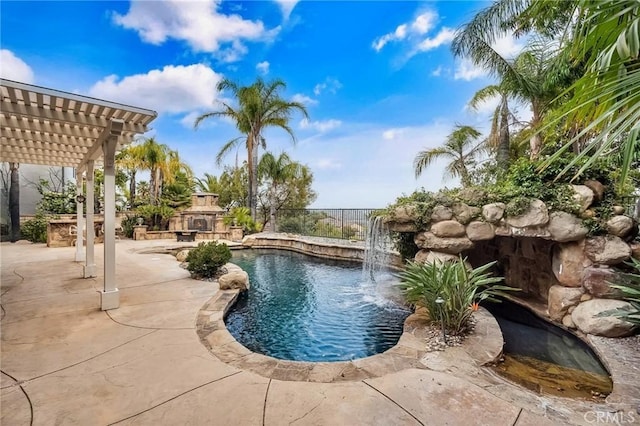 24274 Reyes Adobe Way, Valencia, CA 91354 - view of swimming pool with an outdoor stone fireplace, a patio area, a pergola, and a fenced backyard