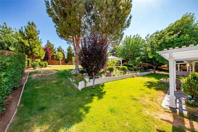 5618 Gardendale Ln, Palmdale, CA 93551 - view of grassy yard featuring a pergola