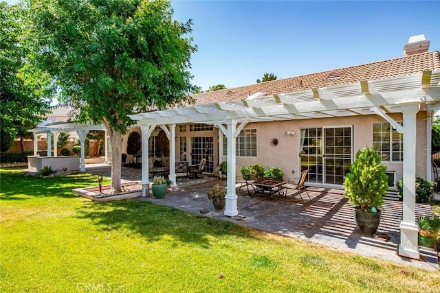 5618 Gardendale Ln, Palmdale, CA 93551 - back of property featuring a pergola, a chimney, stucco siding, a lawn, and a patio