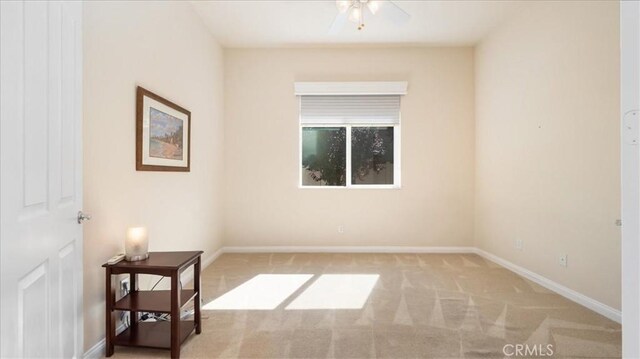 19484 Vermillion Ln, Apple Valley, CA 92308 - unfurnished room with light colored carpet, ceiling fan, and baseboards