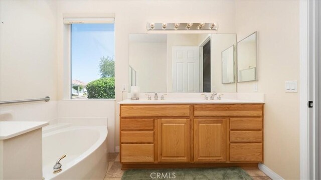 19484 Vermillion Ln, Apple Valley, CA 92308 - bathroom with double vanity, a garden tub, and tile patterned flooring