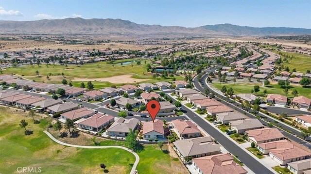 19484 Vermillion Ln, Apple Valley, CA 92308 - aerial view of property's location featuring nearby suburban area, a mountainous background, and a local golf course