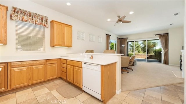 19484 Vermillion Ln, Apple Valley, CA 92308 - kitchen with dishwasher, open floor plan, a peninsula, light tile patterned floors, and light colored carpet