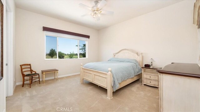 19484 Vermillion Ln, Apple Valley, CA 92308 - bedroom featuring light colored carpet, baseboards, and ceiling fan