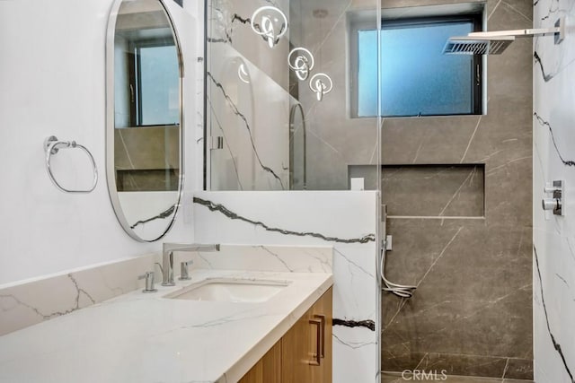 14899 Round Vly, Sherman Oaks, CA 91403 - full bath featuring vanity and a marble finish shower