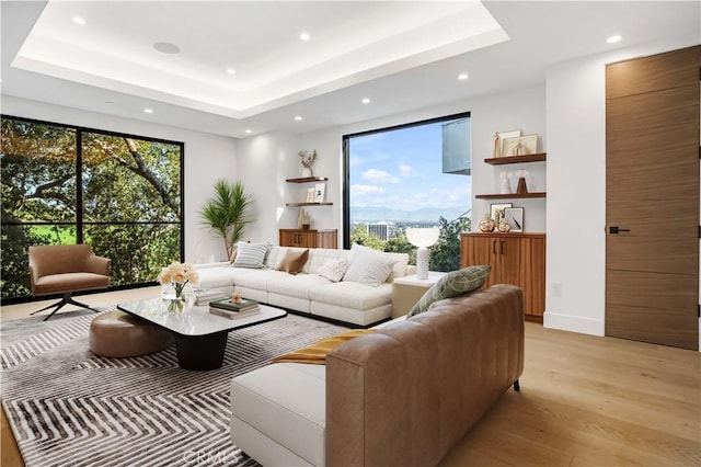 14899 Round Vly, Sherman Oaks, CA 91403 - living area featuring light wood finished floors, recessed lighting, and a raised ceiling