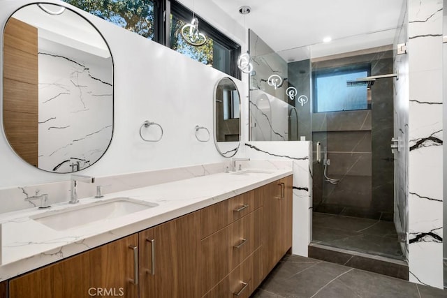 14899 Round Vly, Sherman Oaks, CA 91403 - bathroom featuring double vanity, a marble finish shower, healthy amount of natural light, tile patterned flooring, and recessed lighting