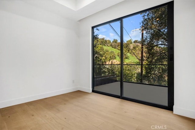 14899 Round Vly, Sherman Oaks, CA 91403 - empty room with light wood-type flooring and baseboards