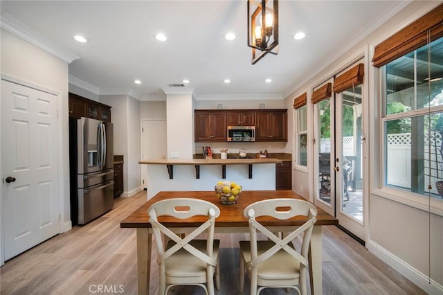 1 Evergreen Rd, Ladera Ranch, CA 92694 - kitchen featuring appliances with stainless steel finishes, baseboards, light wood-style floors, crown molding, and recessed lighting