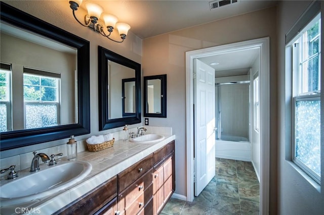 1 Evergreen Rd, Ladera Ranch, CA 92694 - full bath with double vanity, enclosed tub / shower combo, and baseboards
