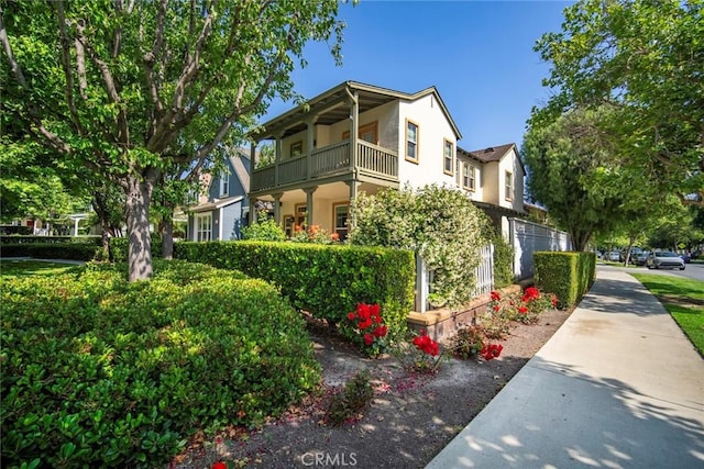 1 Evergreen Rd, Ladera Ranch, CA 92694 - view of side of home with stucco siding and a balcony