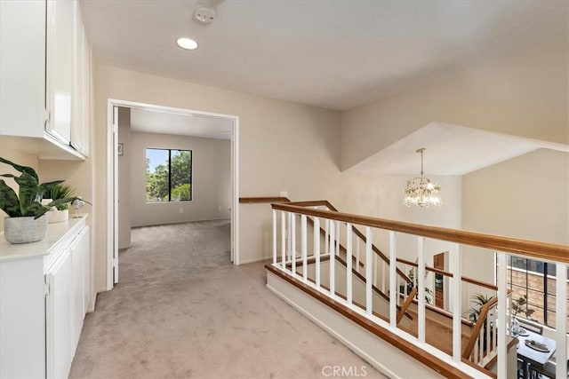 650 Bull Frog Cir, Walnut, CA 91789 - corridor featuring light carpet, an upstairs landing, a chandelier, and recessed lighting