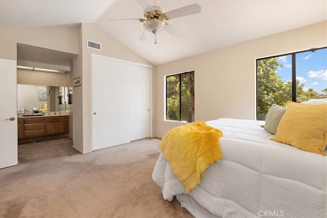 650 Bull Frog Cir, Walnut, CA 91789 - bedroom with multiple windows, light colored carpet, lofted ceiling, ensuite bath, and a closet