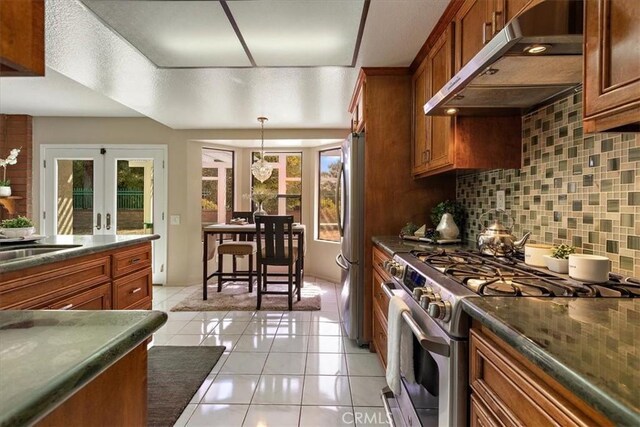 650 Bull Frog Cir, Walnut, CA 91789 - kitchen featuring stainless steel appliances, range hood, brown cabinets, and dark countertops