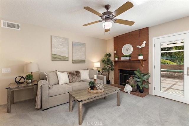 650 Bull Frog Cir, Walnut, CA 91789 - living room featuring carpet floors, a fireplace, and a ceiling fan
