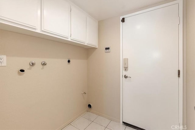 650 Bull Frog Cir, Walnut, CA 91789 - laundry area featuring cabinet space, gas dryer hookup, light tile patterned flooring, electric dryer hookup, and hookup for a washing machine
