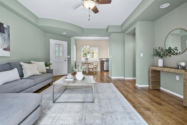 579 Camino Mercado Unit 504, Arroyo Grande, CA 93420 - living area featuring a ceiling fan, wood finished floors, baseboards, and a chandelier