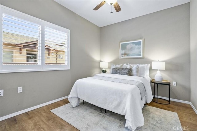 579 Camino Mercado Unit 504, Arroyo Grande, CA 93420 - bedroom with baseboards, wood finished floors, and ceiling fan