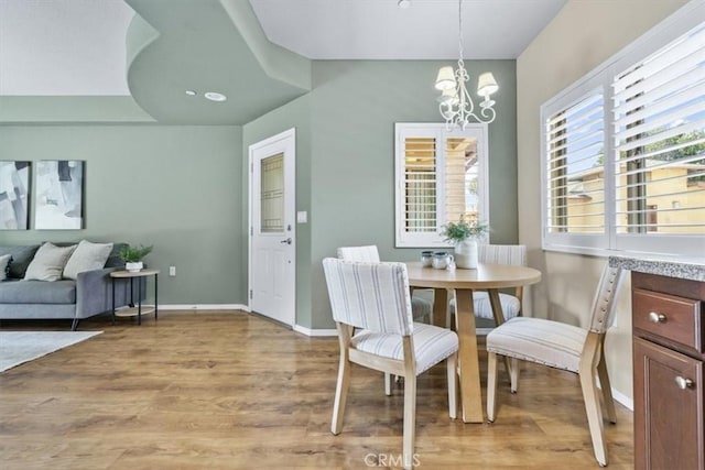579 Camino Mercado Unit 504, Arroyo Grande, CA 93420 - dining space with a chandelier, light wood-style flooring, baseboards, and recessed lighting
