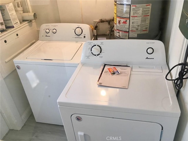 11958 Sarah St, Valley Village, CA 91607 - laundry area featuring washer and clothes dryer and water heater