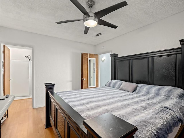 1654 W S Ave, Fresno, CA 93706 - bedroom featuring light wood-type flooring, a textured ceiling, baseboards, and ceiling fan