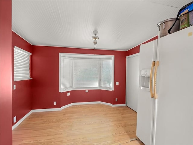 1654 W S Ave, Fresno, CA 93706 - empty room with light wood finished floors and baseboards