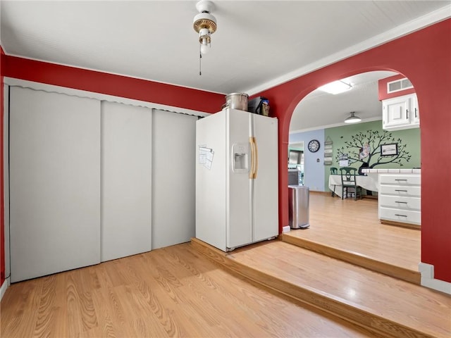 1654 W S Ave, Fresno, CA 93706 - interior space with arched walkways, light wood-style floors, and crown molding