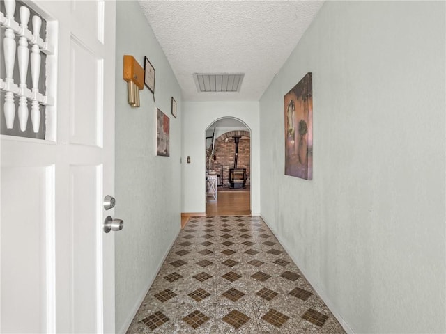 1654 W S Ave, Fresno, CA 93706 - hall with arched walkways and a textured ceiling