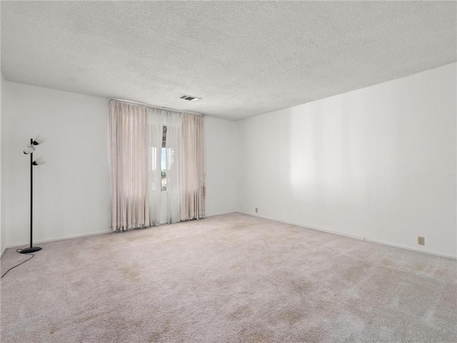 1654 W S Ave, Fresno, CA 93706 - carpeted spare room featuring a textured ceiling