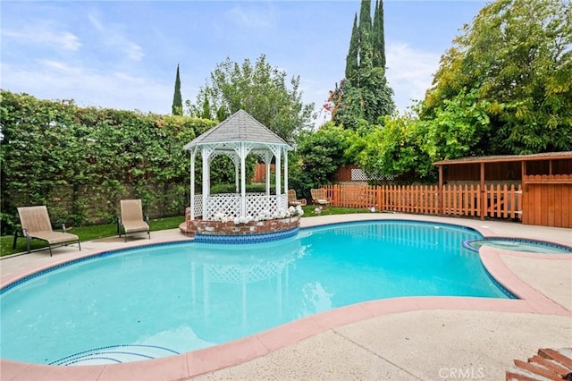 20028 Strathern St, Winnetka, CA 91306 - view of swimming pool featuring a gazebo, a fenced backyard, and a pool with connected hot tub