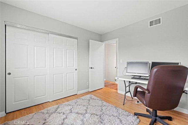 20028 Strathern St, Winnetka, CA 91306 - home office with baseboards and wood finished floors