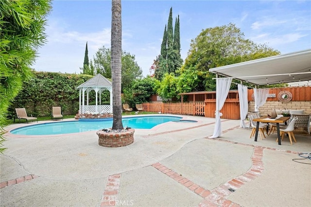 20028 Strathern St, Winnetka, CA 91306 - view of pool with a gazebo, a fenced backyard, and a patio area