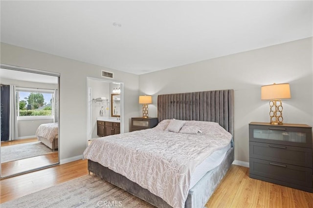 20028 Strathern St, Winnetka, CA 91306 - bedroom featuring light wood-style flooring and baseboards