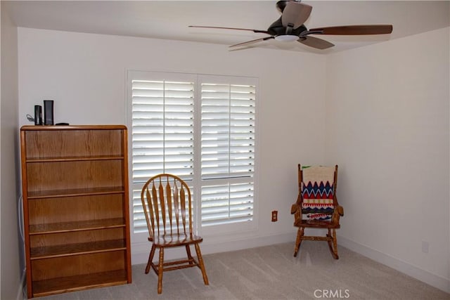 1301 Charterten Ave, Bakersfield, CA 93307 - sitting room featuring ceiling fan, carpet, and baseboards