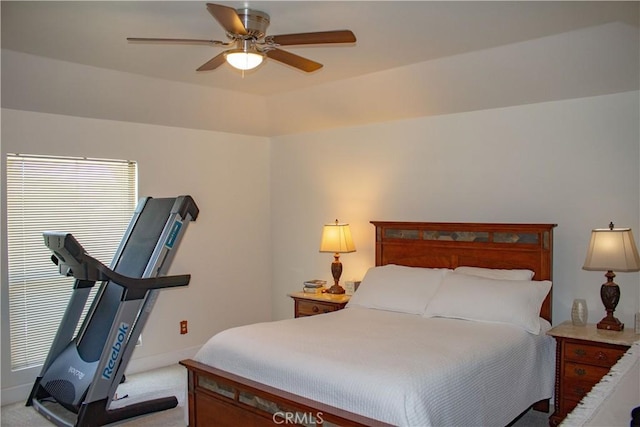 1301 Charterten Ave, Bakersfield, CA 93307 - bedroom featuring light carpet, baseboards, and a ceiling fan