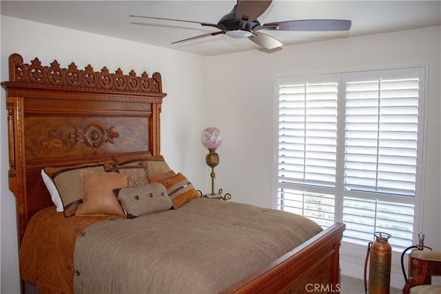 1301 Charterten Ave, Bakersfield, CA 93307 - bedroom featuring multiple windows and a ceiling fan